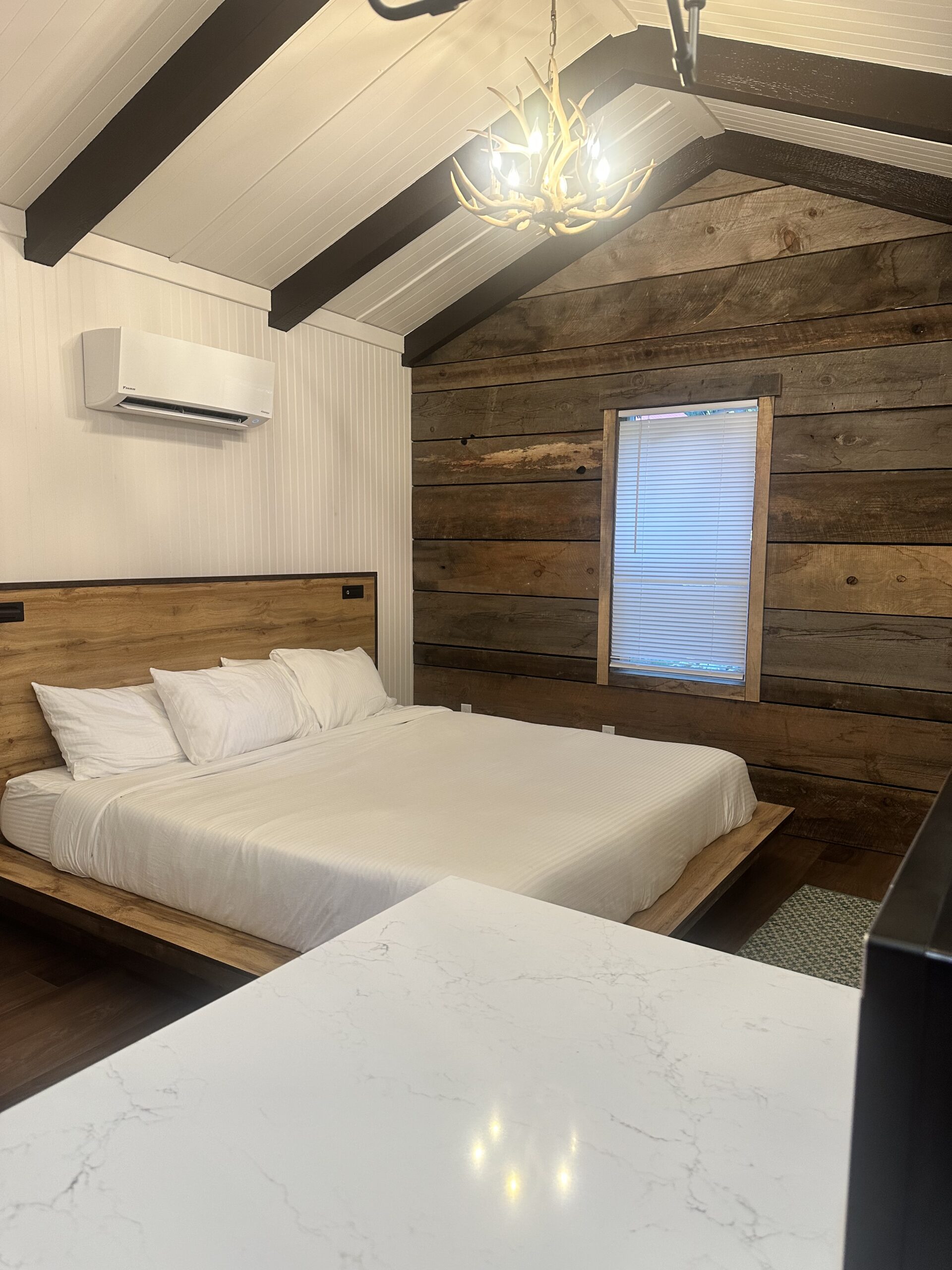 Kitchenette with dark cabinets